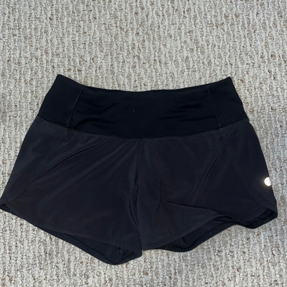 lululemon black speed ups. to big for me barley worn. size 2